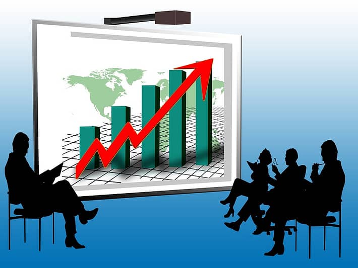 people looking at a bar grap illustration